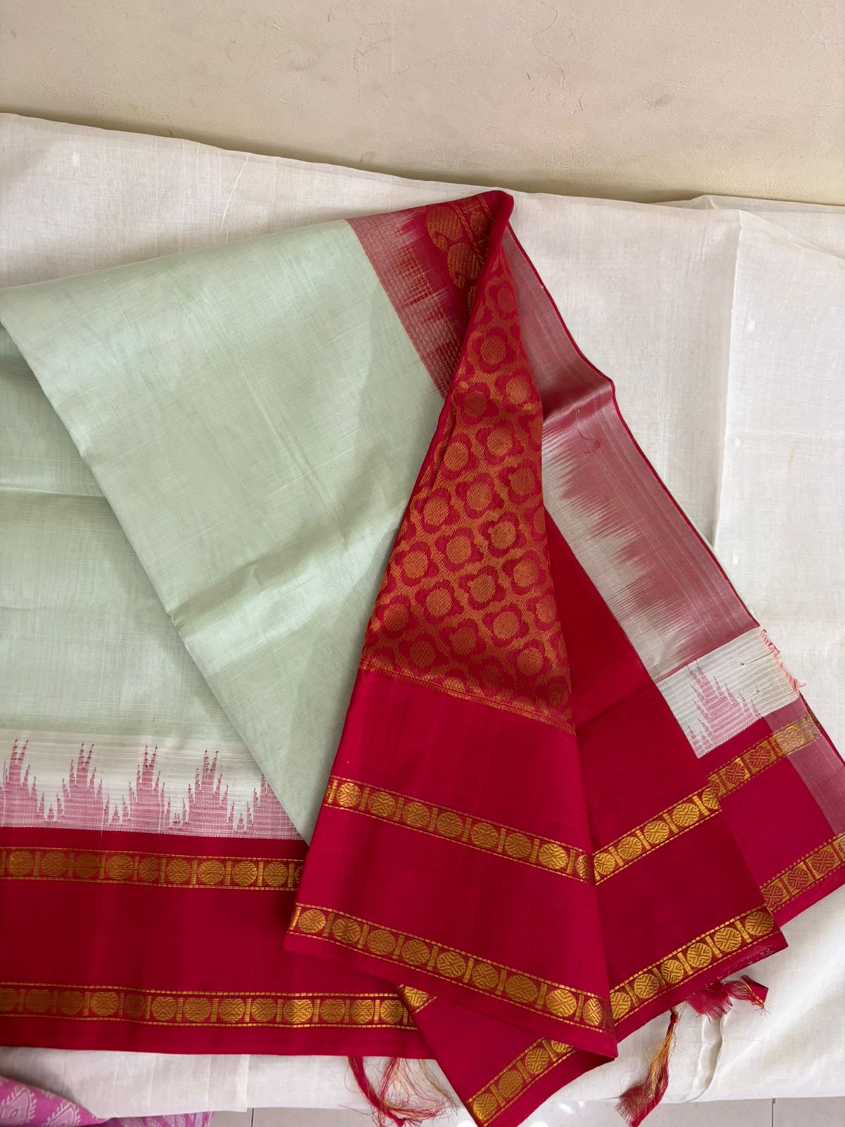 Silk Cotton Saree – pale green with a red contrast border
